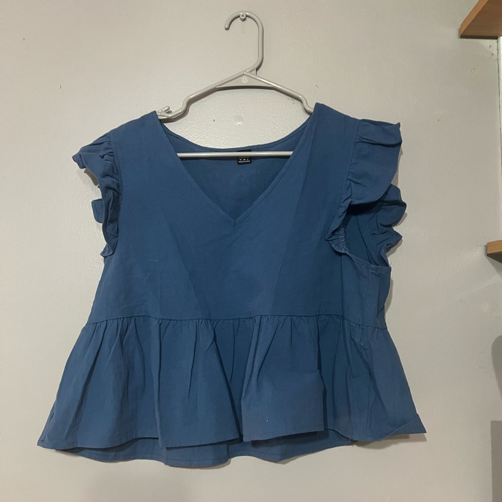 blue peplum flutter sleeve blouse